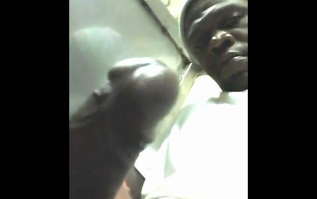 Jacking off his big black cock for the whole world